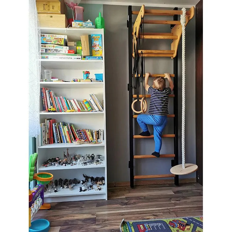 BenchK Series 2 Kids 212B+A076 Wall Bars - A kid climbing in the wall bar