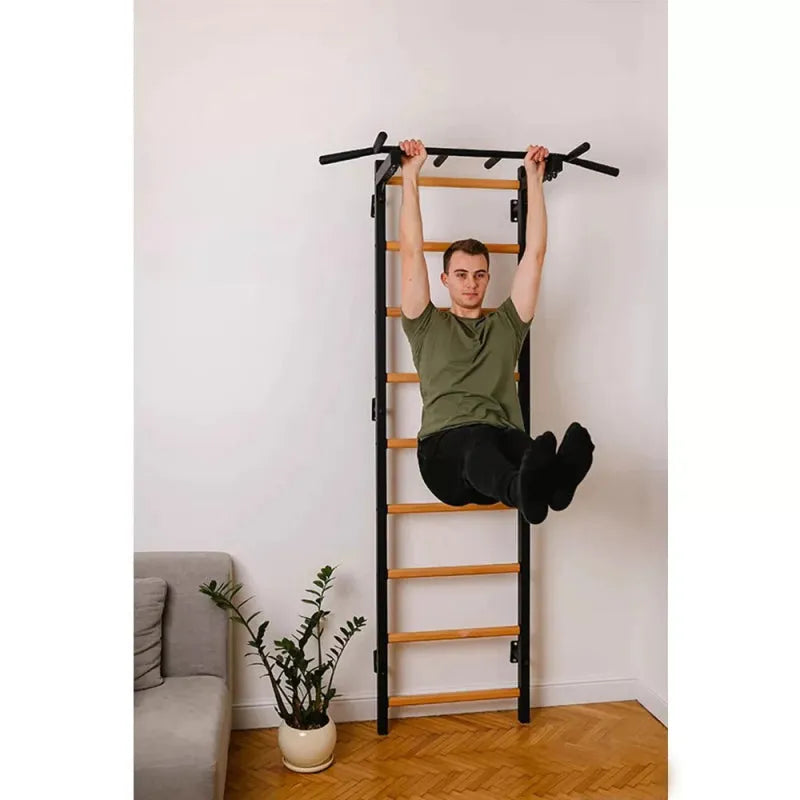 BenchK Stall Bar 721B - Man working out with leg raise