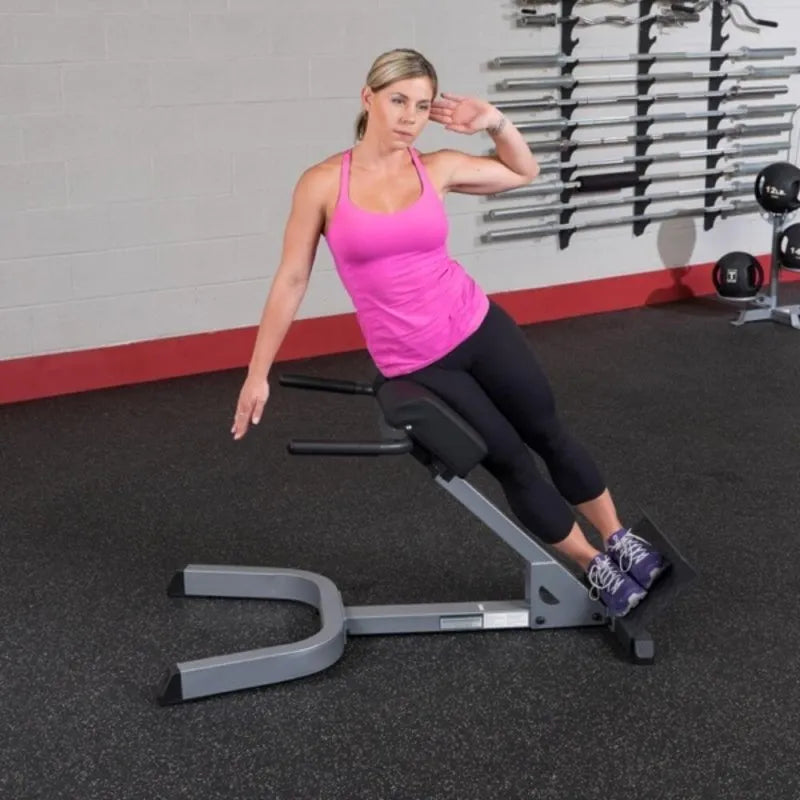 Body-Solid 45° Back Hyperextension GHYP345 - Woman doing upper buddy workout