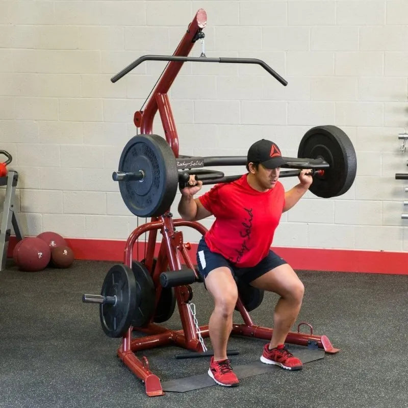 Body-Solid Corner Leverage Gym GLGS100 - Man woking out on squat position