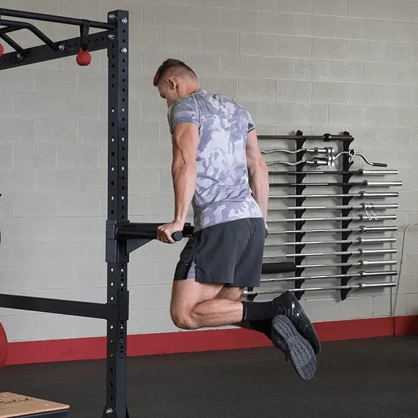 Body Solid Pro Club Line Power Rack Double SPR1000 w. Monkey Bar - man working out