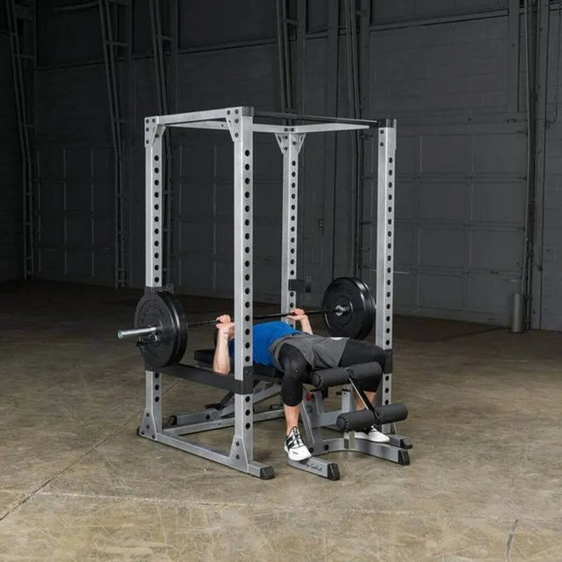 Body-Solid Pro Power Rack GPR378 - Man on horizontal position holding barbell on chest part