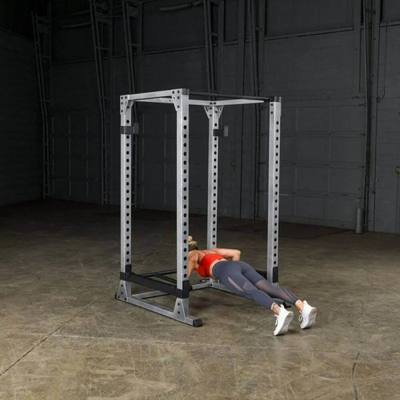 Body-Solid Pro Power Rack GPR378 - Woman doing push ups with the rack