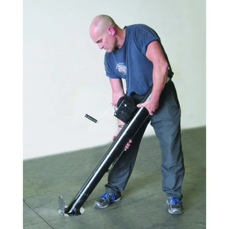 First Team Sentry Tennis Post System - person setting up