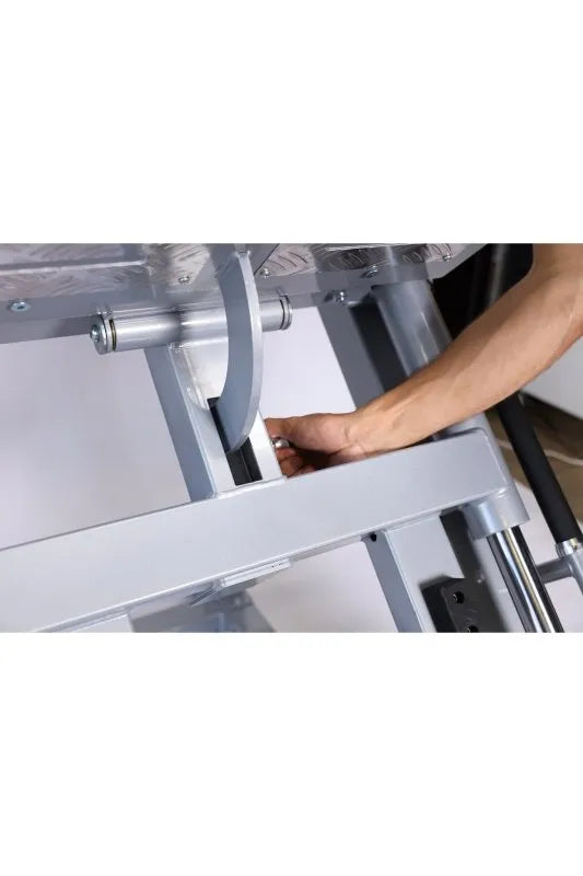 Vortex Strength VLP1000 Leg Press / Hack Squat Combo -  Lockout position with a man hands on it