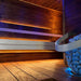 Universal Sauna Light Kit with Two 10-Ft Flexible LED Strips - Installed inside a sauna with sauna stones