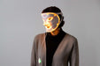 7 Color LED Light Mask - person wearing the mask with yellow lights on