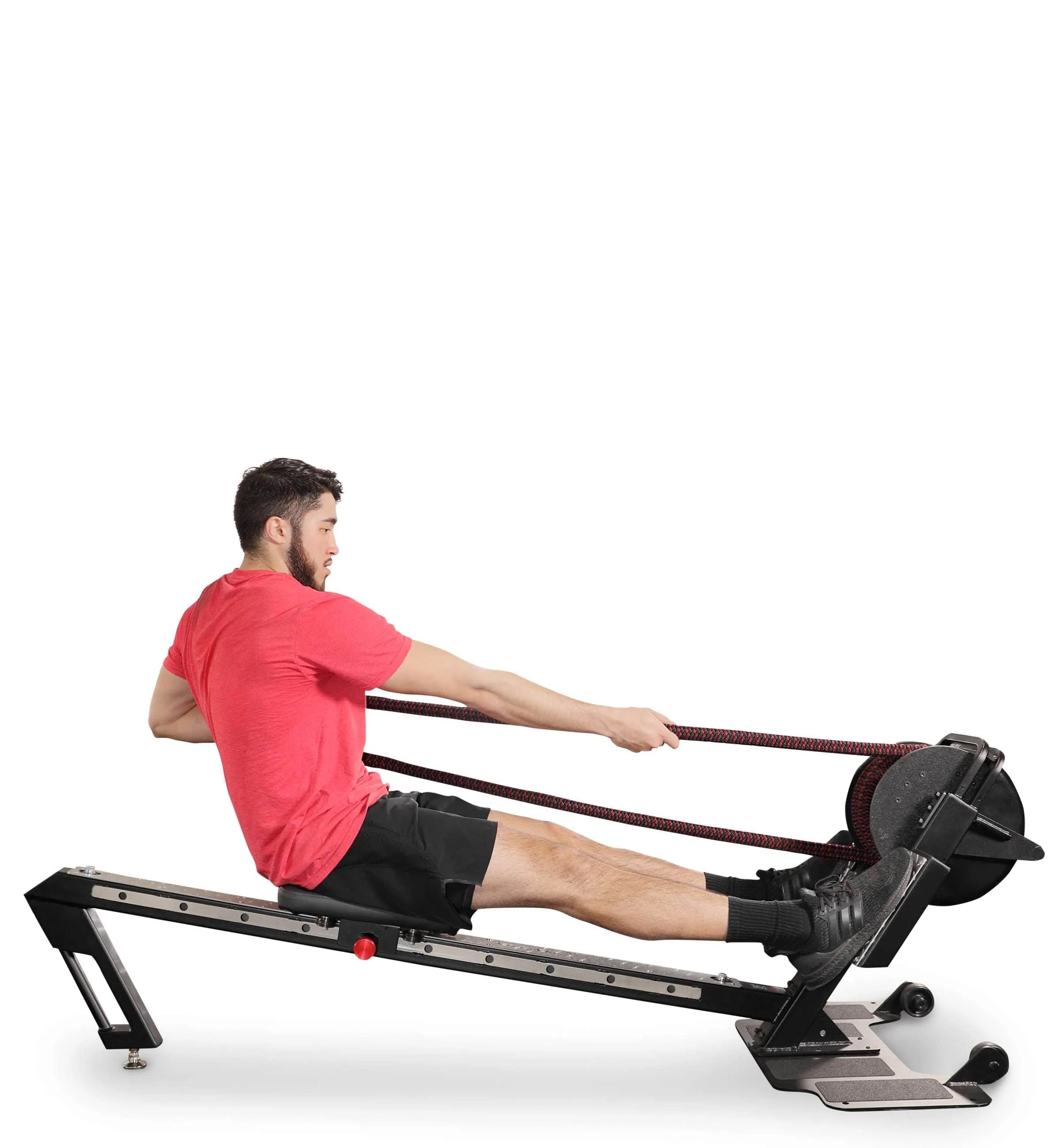 Ropeflex RX3200 ADDAX Rowing Rope Trainer - A man with stretched legs is sitting on a gym machine while pulling a rope