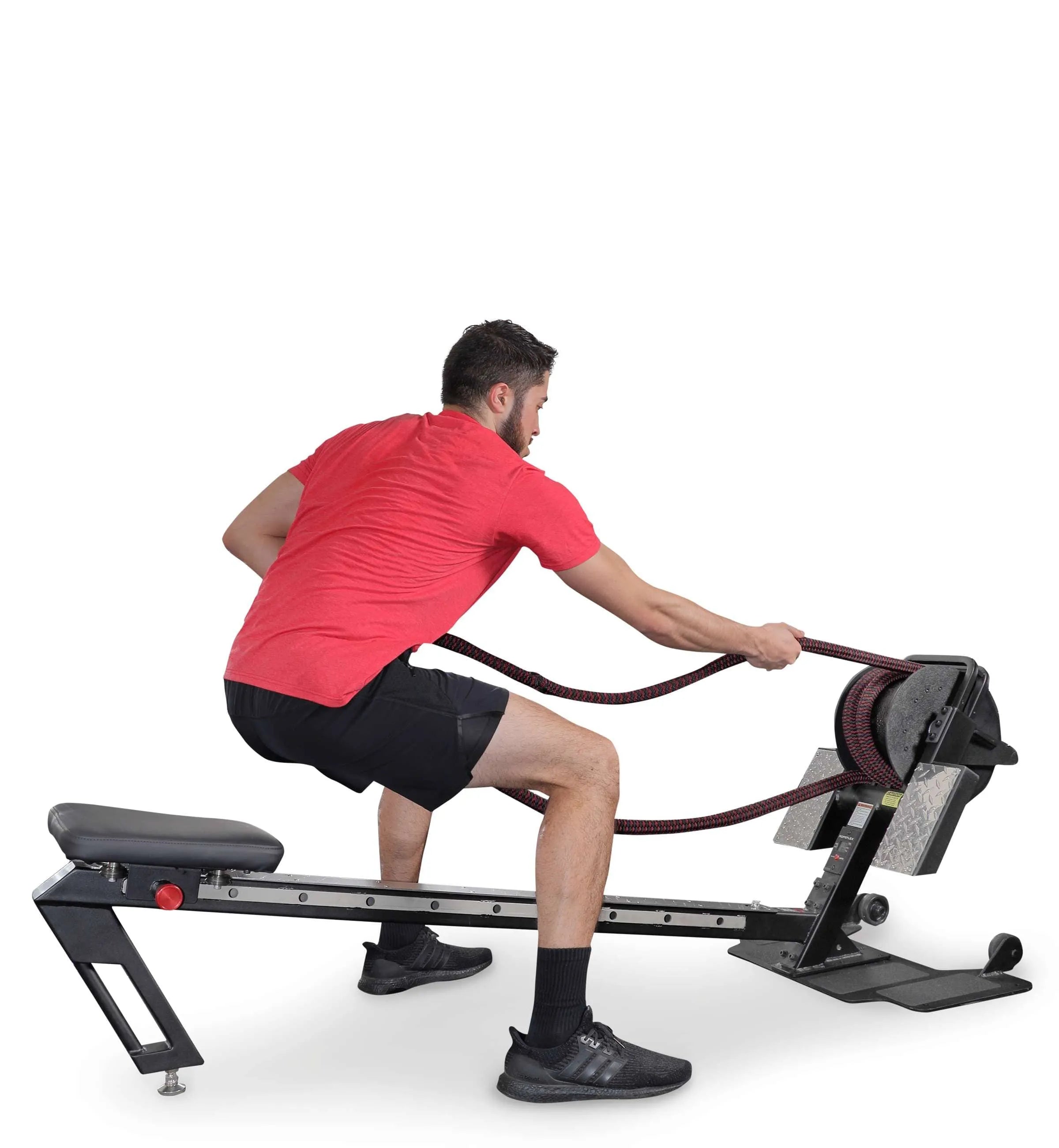 Ropeflex RX3200 ADDAX Rowing Rope Trainer - A man facing away from the camera while in a squat position is pulling a rope from a gym machine