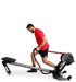 Ropeflex RX3200 ADDAX Rowing Rope Trainer - A man in red shirt pulling a rope from a fitness machine