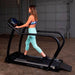 Body-Solid Endurance Walking Treadmill T50 - Other side of the treadmill with a woman on workout