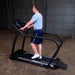 Body-Solid Endurance Walking Treadmill T50 - side view photo of man working out