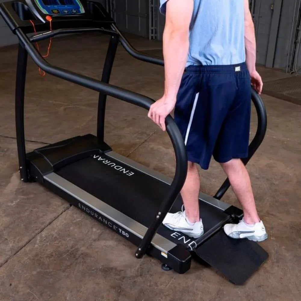 Body-Solid Endurance Walking Treadmill T50  - man foot stepping on the walking belt