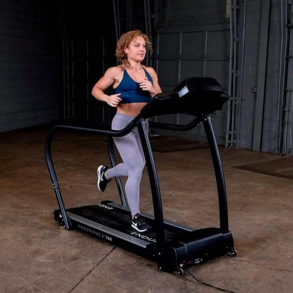 Body-Solid Endurance Walking Treadmill T50 - woman working out on treadmill