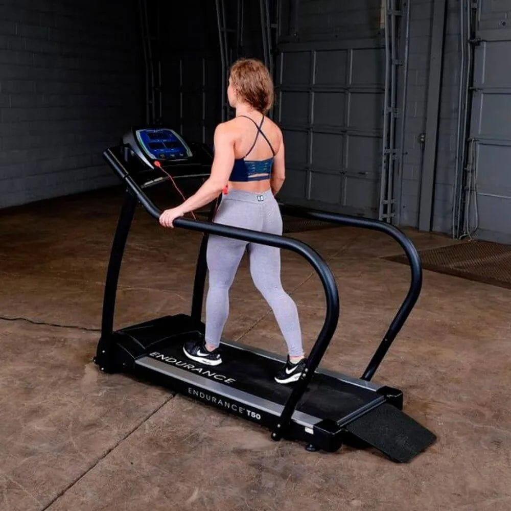 Body-Solid Endurance Walking Treadmill T50 - back photo of a woman using the equipment