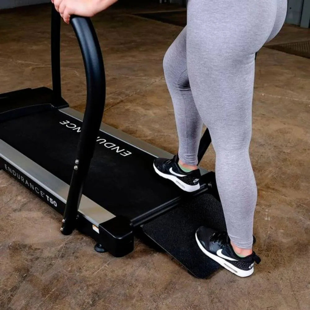 Body-Solid Endurance Walking Treadmill T50 - woman foot on the running belt