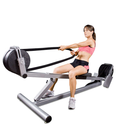 Ropeflex RX3300 VORTEX Dual Drum Incline Rope Trainer - A woman in pink gym attire is sitting while pulling a rope from a fitness machine