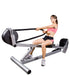 Ropeflex RX3300 VORTEX Dual Drum Incline Rope Trainer - A woman in pink gym attire is sitting while pulling a rope from a fitness machine