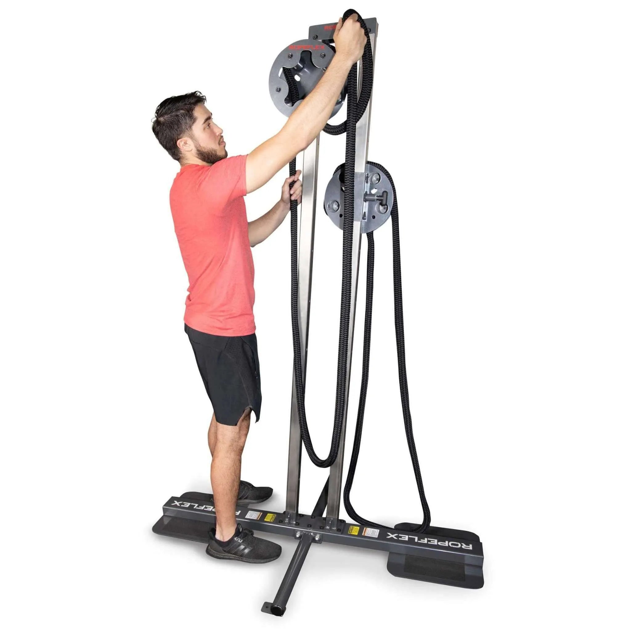 Ropeflex RX1500 Elite Rope Training Station - Man making adjustments to the machine