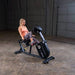 Body-Solid Endurance Recumbent Bike B4RB - front view of the product with woman using the bike