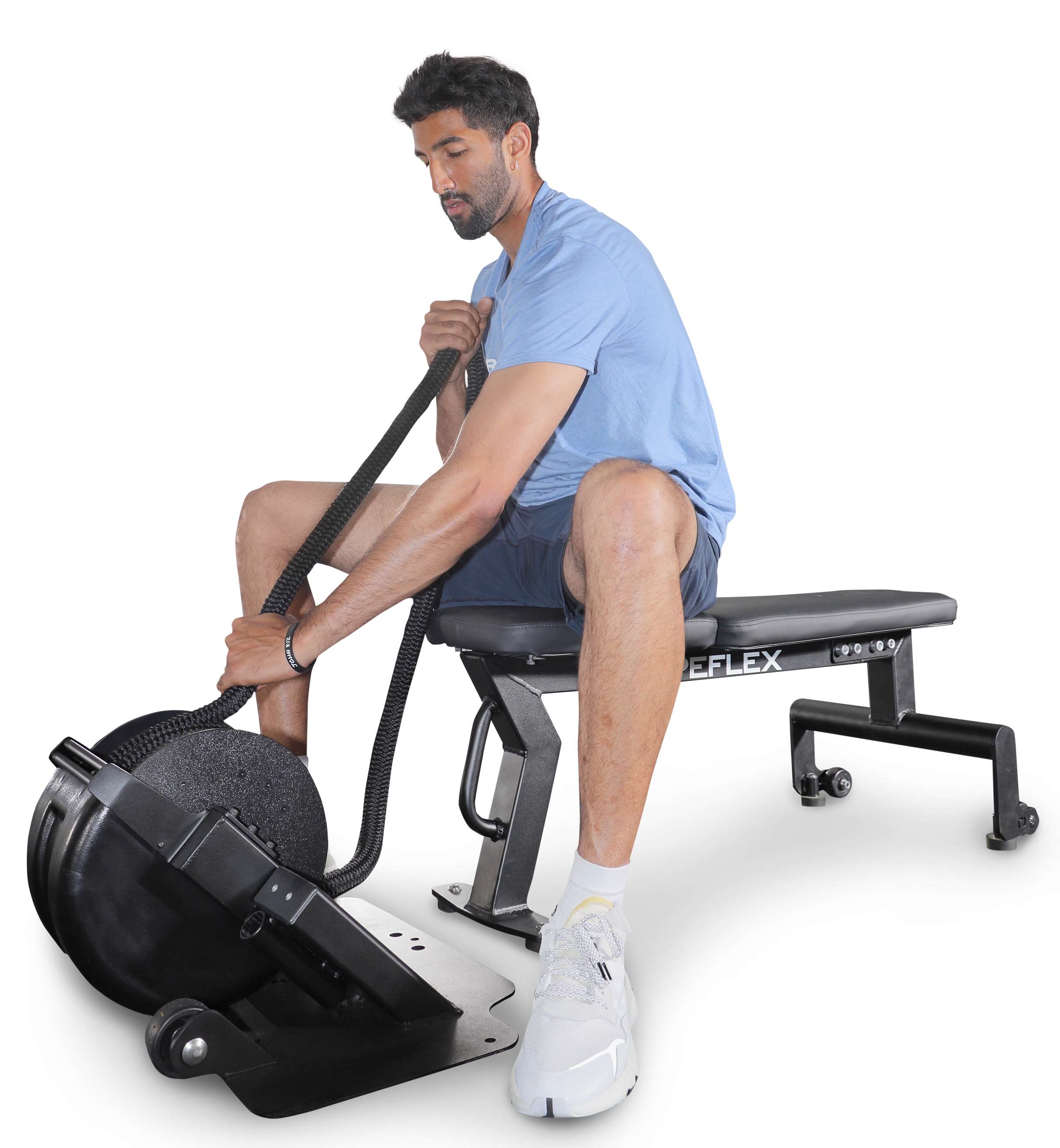 Ropeflex RXB2 Flat Bench - Man in a blue shirt is pulling a rope while sitting on a flat bench