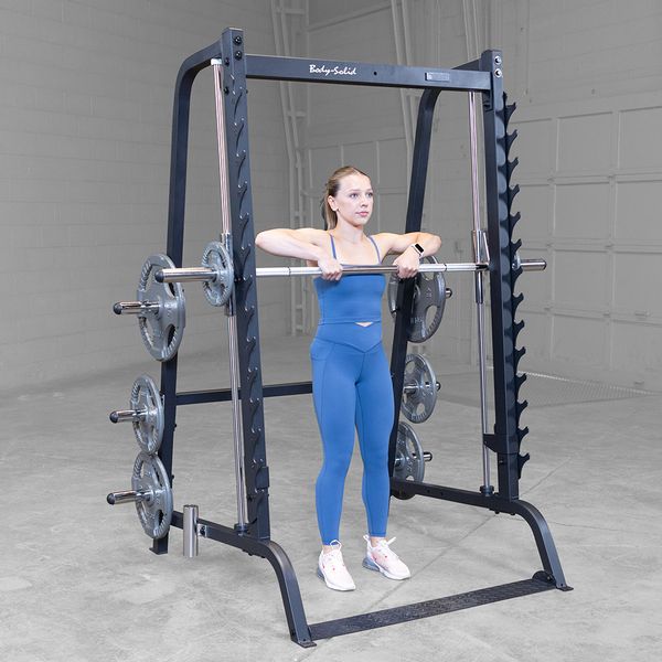 Body-Solid Series 7 Smith Machine - Woman model doing lifts on smith machine