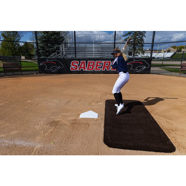 Portolite Half Batter's Mat - woman pitching on black mat 