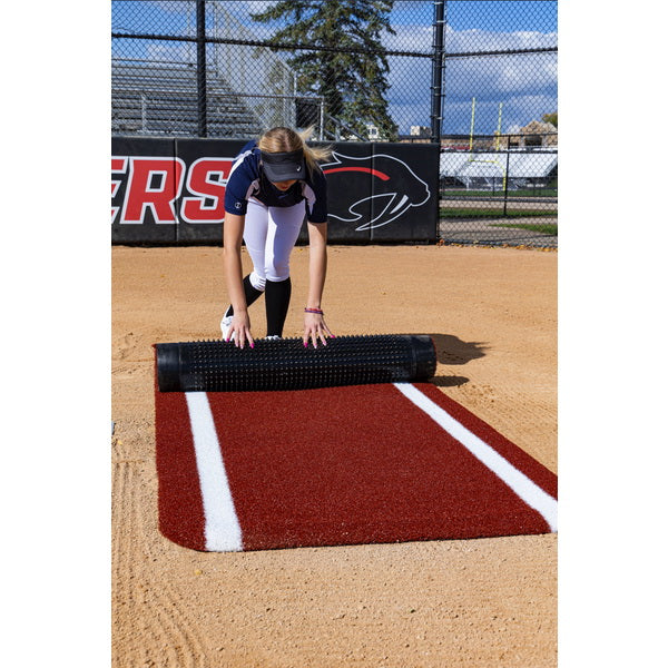 Portolite Half Batter's Mat - woman rolling the mat 