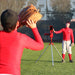 Heater Softball Machine with Automatic Ball Feeder - catching