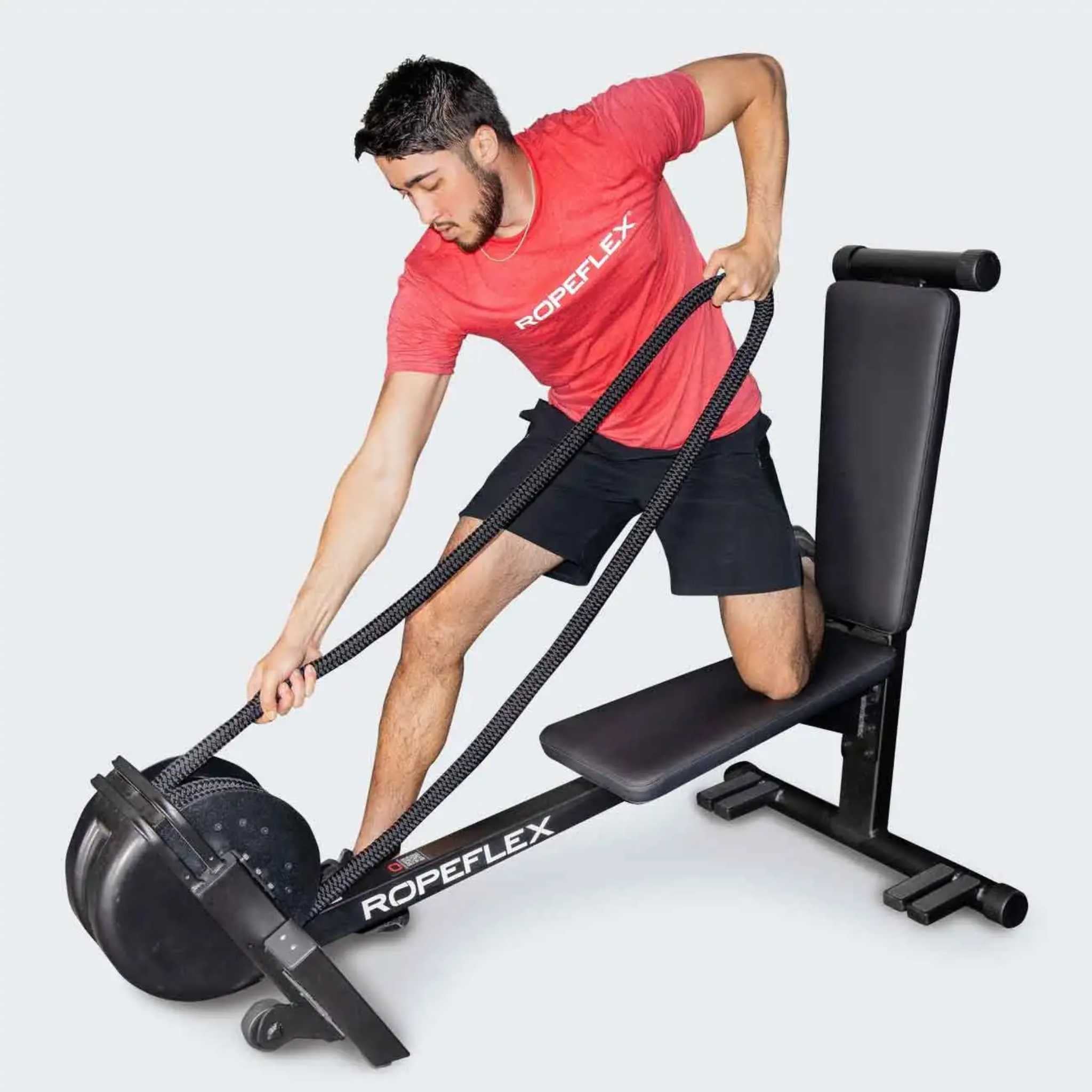 Ropeflex RX2300 IBEX Multi Position Rope Trainer - a man is using a rowing machine