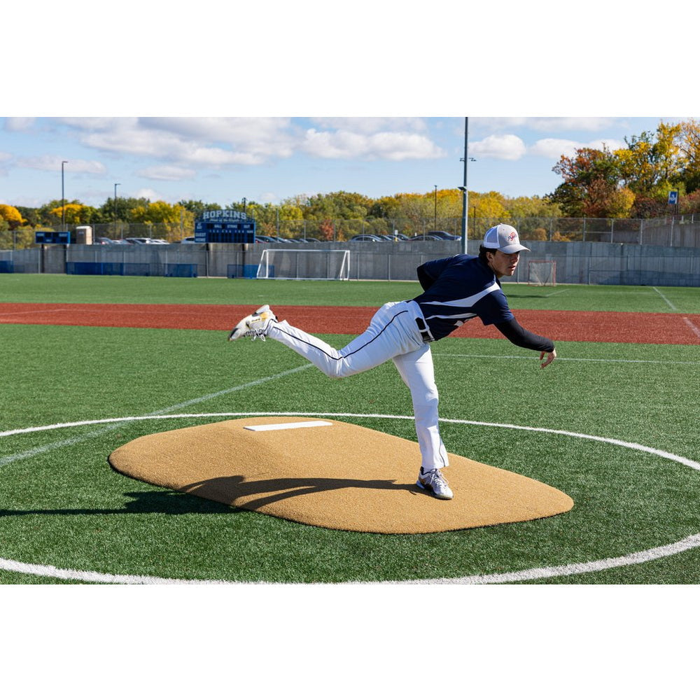 PortoLite 8" Full Length Baseball Portable Pitching Mound - next to some goals and fences