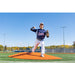 PortoLite Two-Piece 10" Portable Game Mound - man throwing baseball