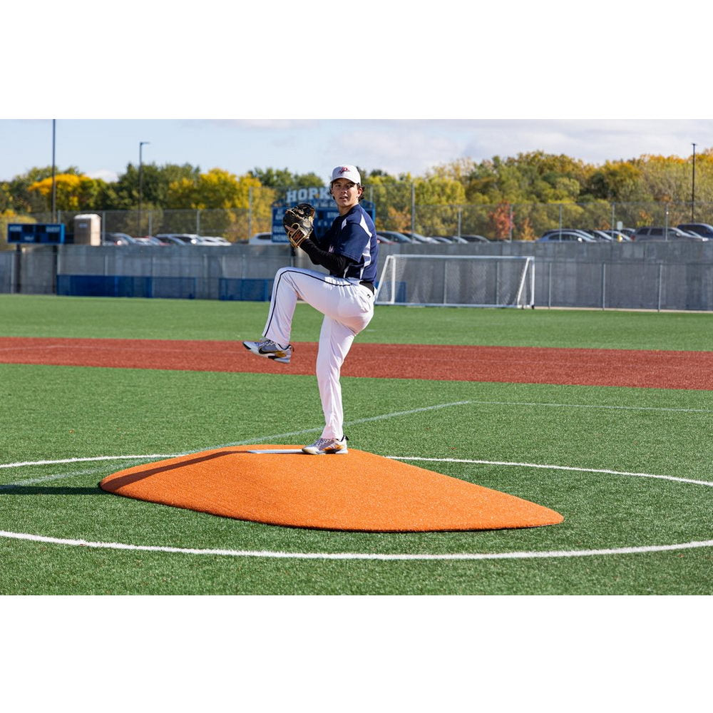 Portolite 10" One-Piece Baseball Game Mound - with a player standing on it