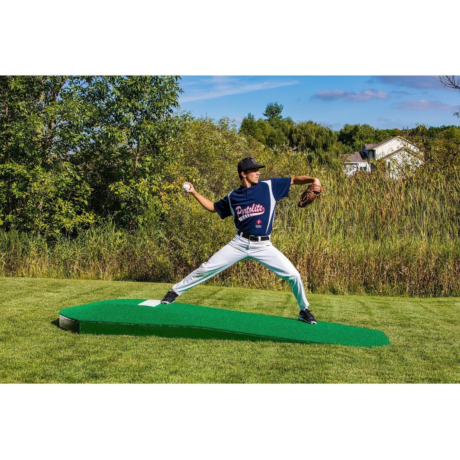 Portolite 10" One-Piece Portable Baseball Practice Pitching Mound 1150 - green mound with man standing on it 