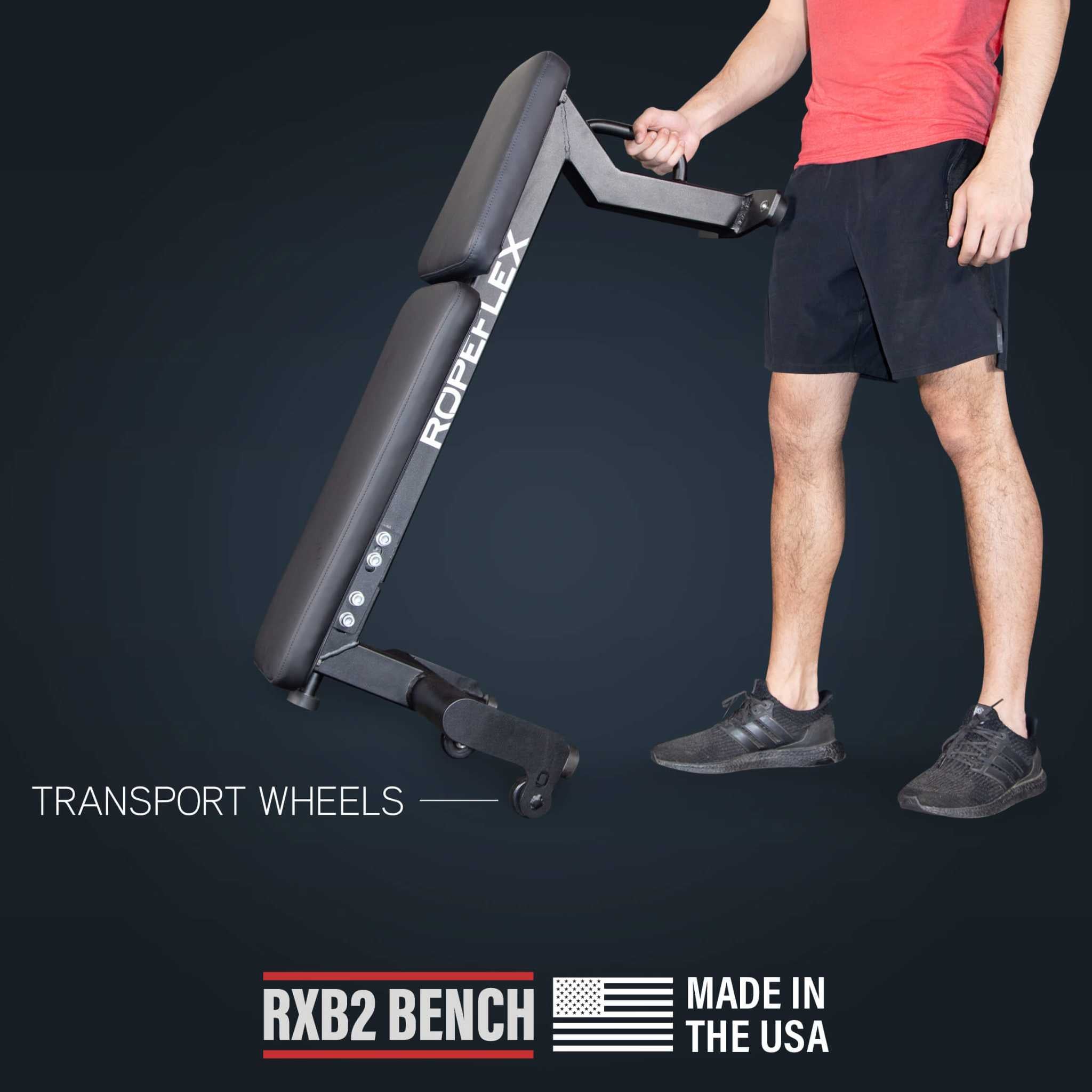 Ropeflex RXB2 Flat Bench - An individual holding up a flat bench with transport wheels