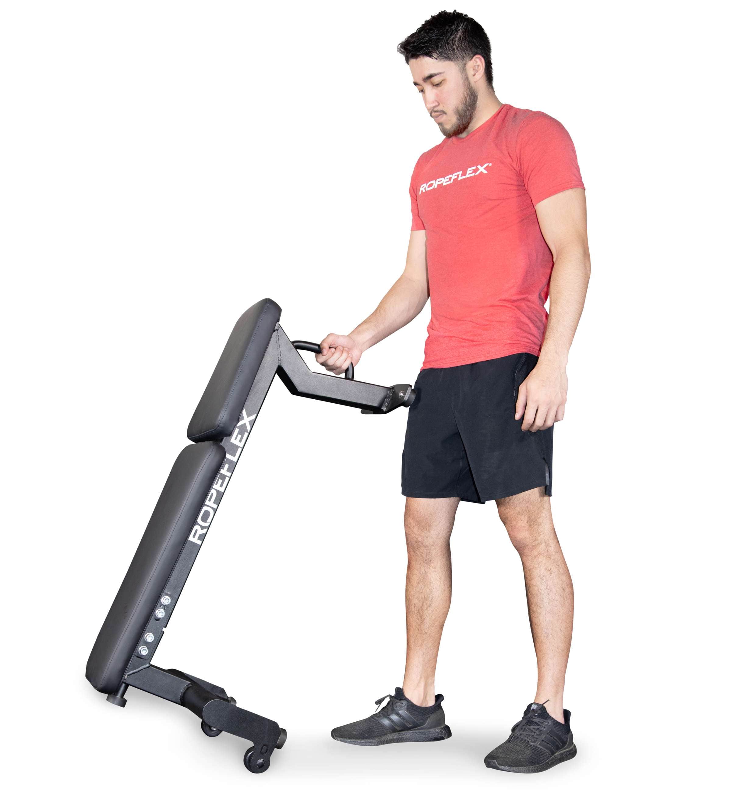 Ropeflex RXB2 Flat Bench - A man is standing straight while holding up a wheeled flat bench