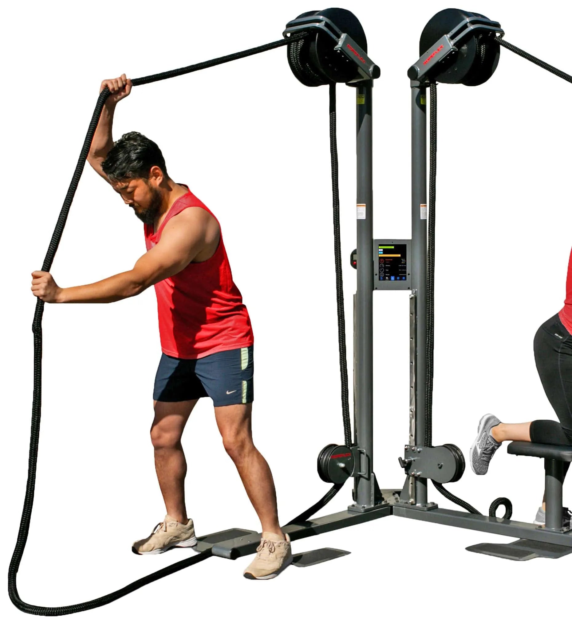 Ropeflex RX2500D Oryx Dual Station Rope Trainer - An individual engaged in exercise on a fitness machine
