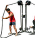 Ropeflex RX2500D Oryx Dual Station Rope Trainer - An individual engaged in exercise on a fitness machine