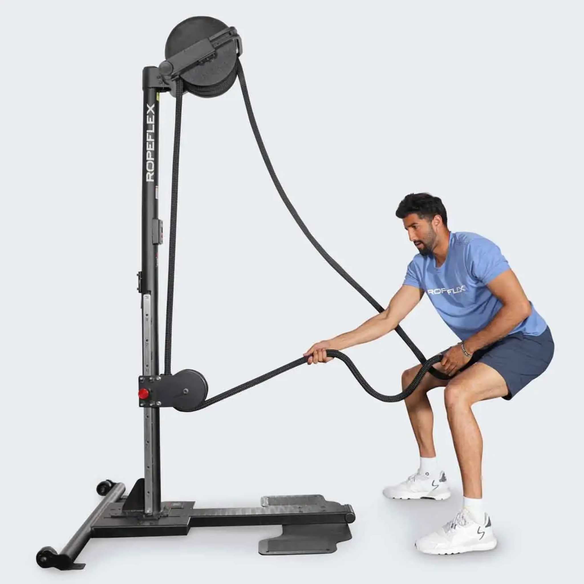 Ropeflex RX2500 ORYX Multi Mode Rope Trainer - a man is using a pull up machine