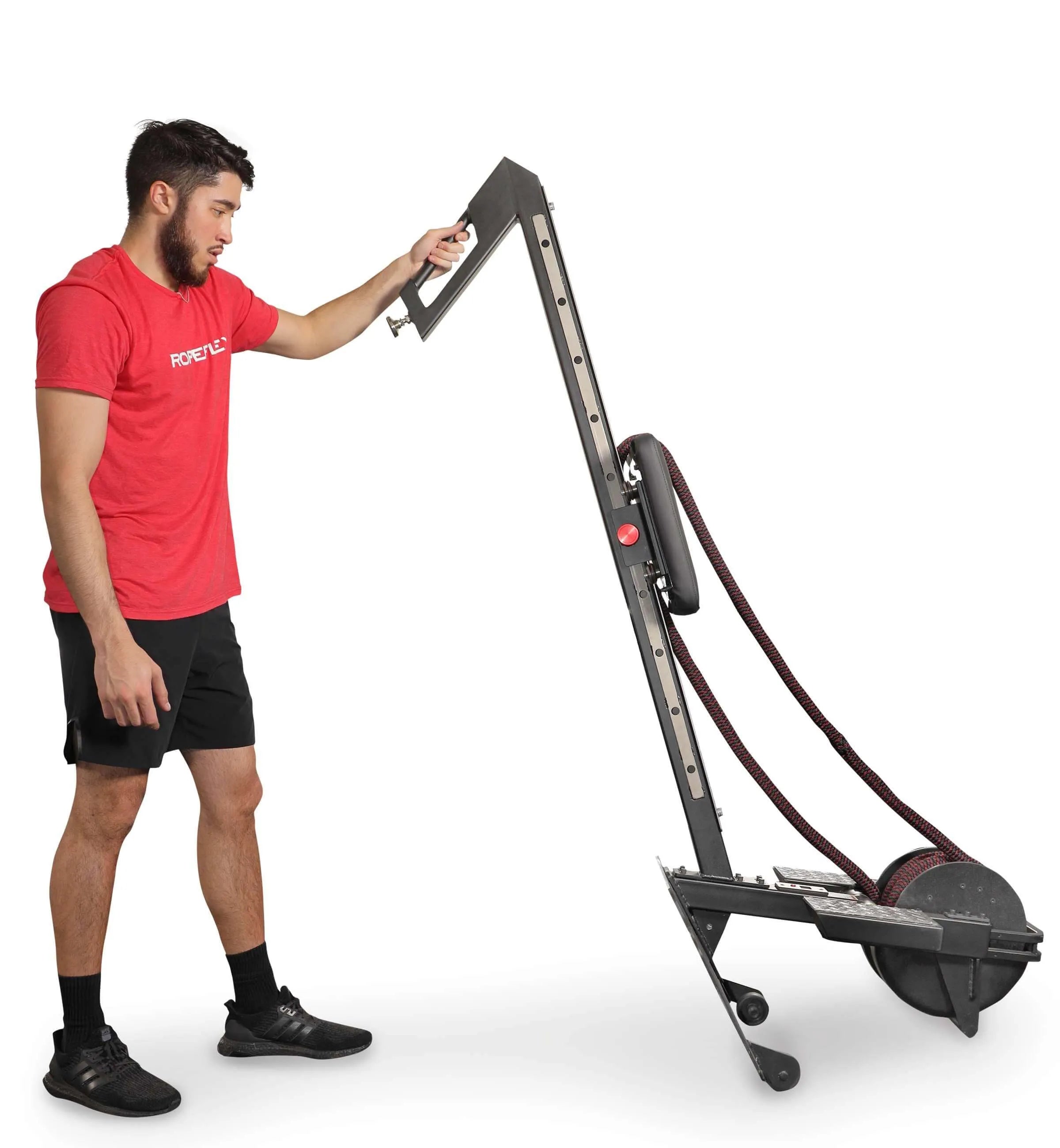 Ropeflex RX3200 ADDAX Rowing Rope Trainer - A man standing next and holding a rope machine