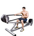 Ropeflex RX3300 VORTEX Dual Drum Incline Rope Trainer - A man pulling a rope from a gym machine while sitting