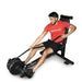 Ropeflex RX2300 IBEX Multi Position Rope Trainer - man sitting on the machine while pulling rope upward