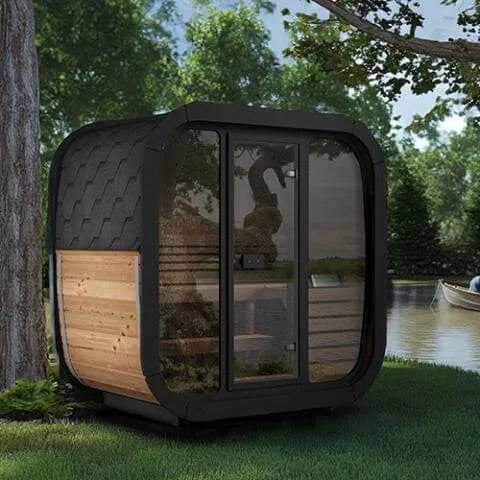 SaunaLife Model CL4G Outdoor Home Sauna - Wooden sauna cabin with a glass door, placed by a lake