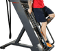 Ropeflex RX4400 APEX Tread Climbing Rope Trainer - An individual is getting down of a fitness machine