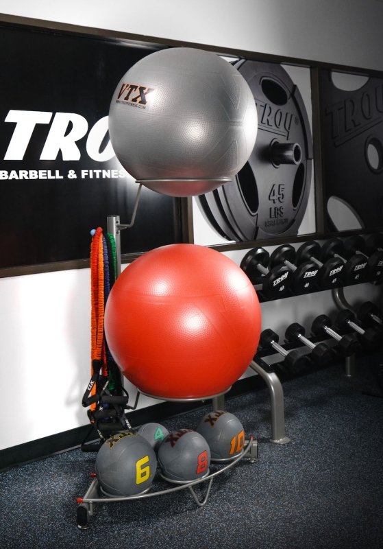 Accessories Rack - will several exercise balls in different sizes