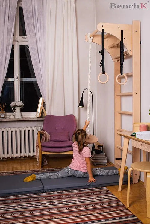 BenchK Gymnastics Mat - Girl using gray mat in split position 