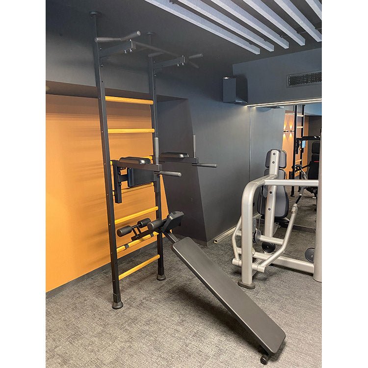 BenchK Series 5 523B Wall Bars with Bench -  Wall bar in a gym room