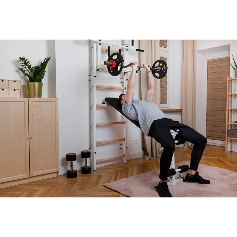 BenchK Wall Bars 733B - man inclined position in bench holding a barbell