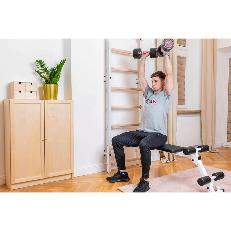 BenchK Workout Bench B1B - man sitting straight holding the dumbbells