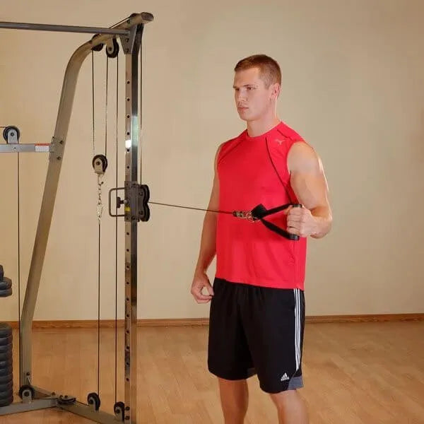 Best Fitness BFFT10R Functional Trainer - man using left arm while using pulleys